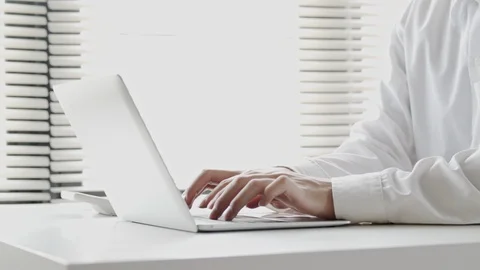 Close up hand of businessman using laptop Stock Footage 113238980