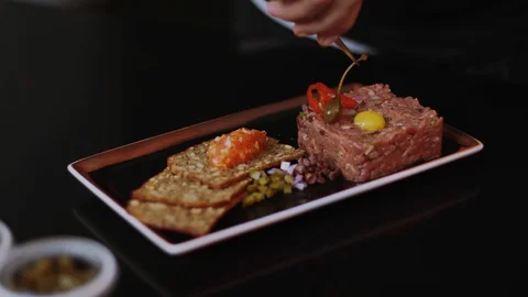 Close up hand chef man finishing special dishes for guest of restaurant plate Stock Footage 100304261
