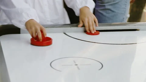 Close-up of hand of a child playing air hockey Stock Footage 137243620