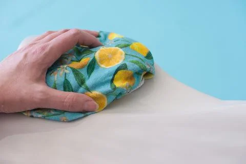 Close-up of Hand Cleaning Pool Edge Stock Photos