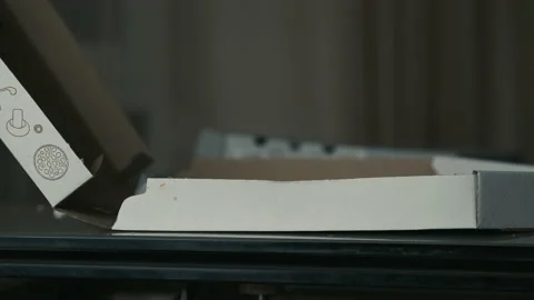 Close-up of a hand closing a pizza box Stock Footage 151348510
