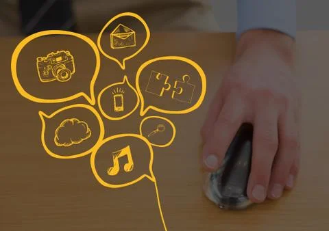 Close up of hand on computer mouse with yellow business doodles and dark overlay Foto stock