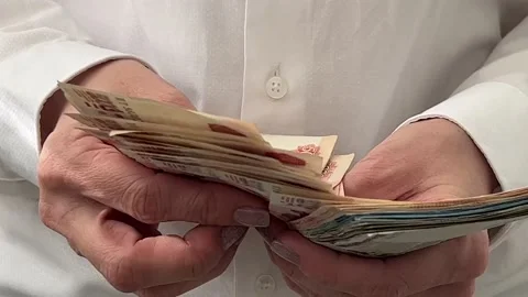 Close-up of a hand considers Russian banknotes. The concept of business, finance Video stock 195527805