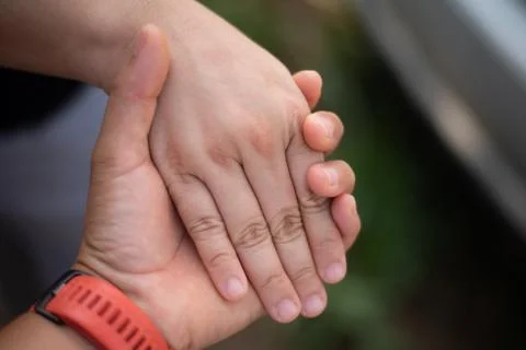 Close up hand couple on blured background. Stock Photos