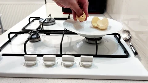 Close Up of a Hand Cracking a Fragile Shell with Gentle Pressure Stock Footage 315550621