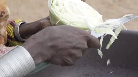 Close up of hand cutting cabbage. Stock Footage 319298592