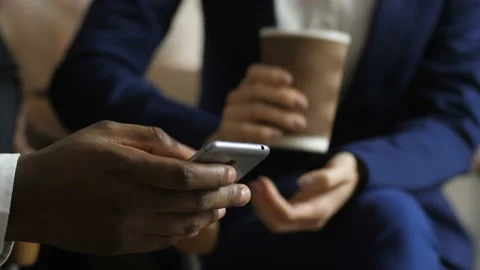 Close up hand of dark-skinned man using cellphone Stock Footage 108011763