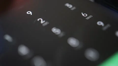 Close-up hand dialing emergency number on the phone. 911 dial and call 動画素材 196157954
