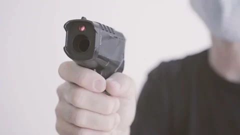 Close up hand with digital infrared thermometer gun takes temperature reading Stock Footage 135252556