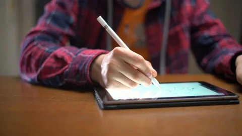 Close up hand with digital pen draw on tablet Stock Footage 114312584