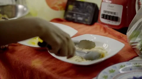 Close Up of Hand Dipping Breaded Food Into Flour During Cooking Preparation Stock Footage 345529957