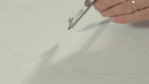 Close Up of Hand Drawing Circular Arc with Compass Stock Footage 339009208