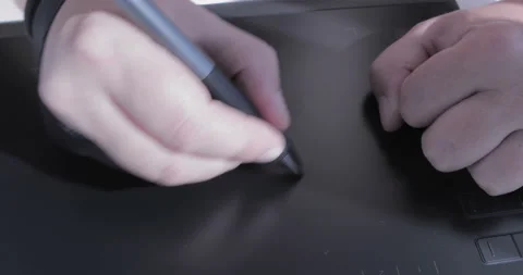 Close-up of hand drawing on a digital tablet with pencil Stock Footage 114951158