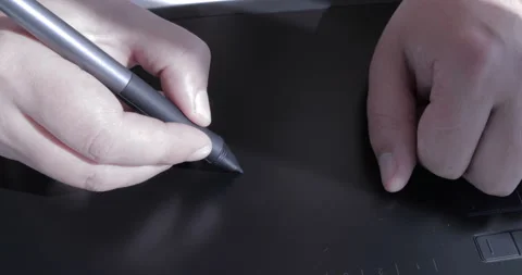 Close-up of hand drawing on a digital tablet with pencil Stock Footage 114951261