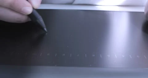 Close-up of hand drawing on a digital tablet with pencil Stock Footage 114951518