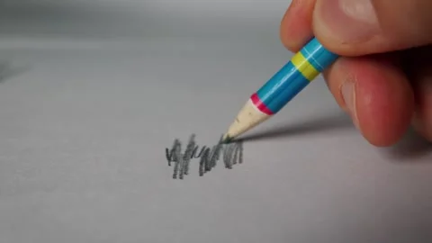 Close Up of Hand Drawing with Graphite Pencil on White Paper Stock Footage 339365608