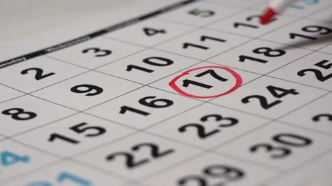 Close-up Hand Draws Red Marker Number on the Calendar. Stock Footage 151531492