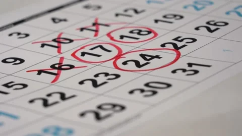 Close-up Hand Draws Red Marker Number on the Calendar. Stock Footage 156350463