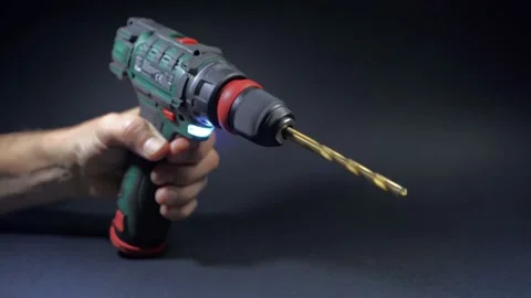 Close up hand drill concept. black background. craftsmanship Stock Footage 219235875