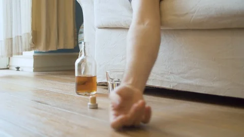 Close up hand of drunk man Stock Footage 129282789