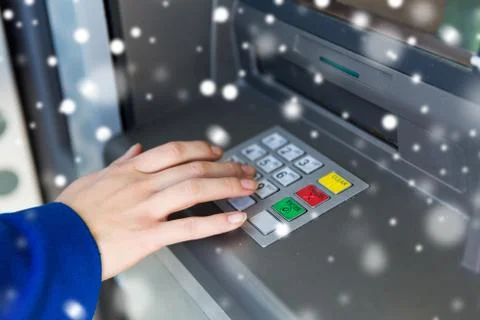 Close up of hand entering pin code at cash machine 스톡 사진