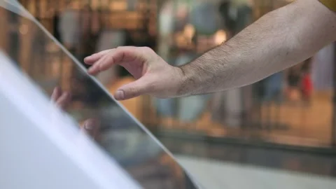 Close-up of hand exploring glossy touchscreen Stock Footage 341482653