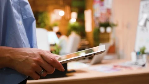 Close up hand of female content creator typing on tablet Stock Footage 113864762