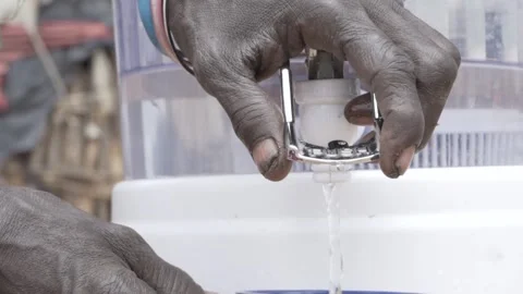 Close up hand fetching water. Stock Footage 319290942