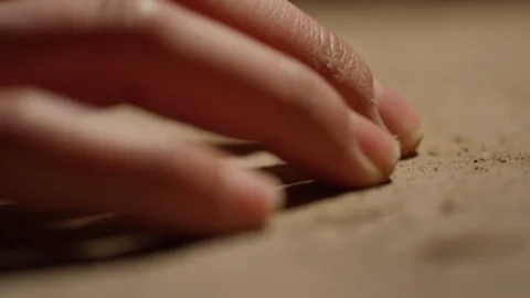 Close up hand fingers on the flore Stock Footage 129587430