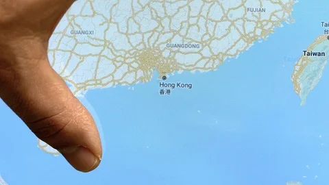 Close up hand gesture on touch screen zooming in Hong Kong city Stock Footage 127497002