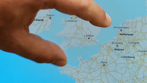 Close up hand gesture on touch screen zoom in London city England Stock-Footage 128457094