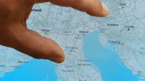 Close up hand gesture on touch screen zoom in Venice city Italy Stock-Footage 128457607
