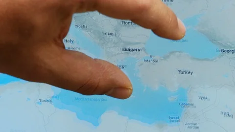 Close up hand gesture on touch screen zoom in Istanbul city Turkey Stock-Footage 128457934