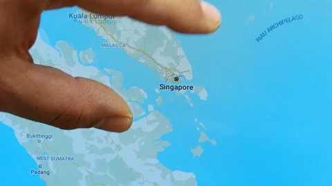 Close up hand gesture on touch screen zoom in New Dehli city India Stock Footage 128461097