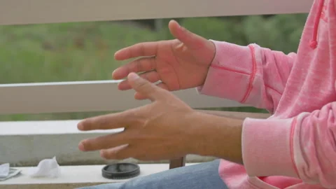 Close up of hand gestures of professional surfer Rafael Tapia while talking Video stock 158652109