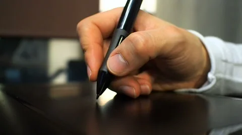 Close up of the hand of a graphic designer clicking button on 스톡 동영상 67218964
