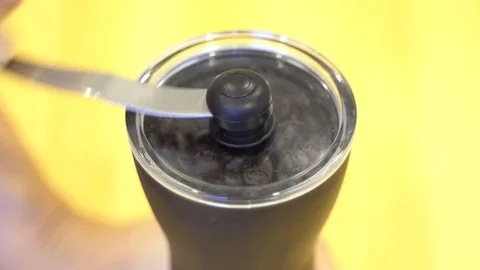 Close up hand grinder machine coffee beans Stock Footage 108984322