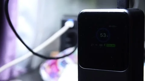 Close-up of hand gripping black power bank Stock Footage 342122871