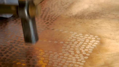 Close up of hand hammered sheet of copper in slow motion Video stock 98843180