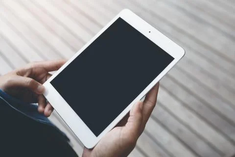 Close-up hand hold digital tablet blank screen Stock Photos