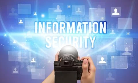 Close-up of hand holding camera Stock Photos