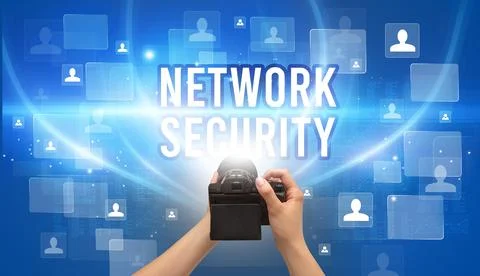 Close-up of hand holding camera Stock Photos