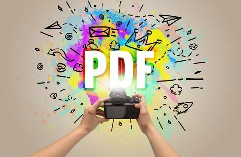 Close-up of a hand holding digital camera with abstract drawing Stock Photos