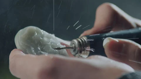 Close up of hand holding electric drill for carving jade, China Stock Footage 140765792