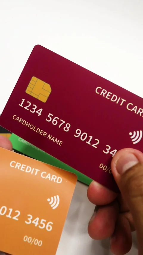 Close Up of Hand Holding Multiple Credit Cards. Stock Footage 289389047