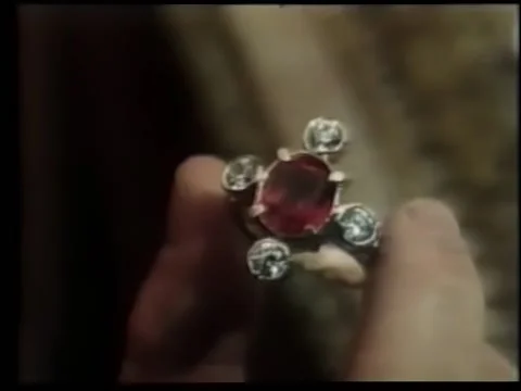 Close-up of hand holding ruby ring Stock Footage 260250116