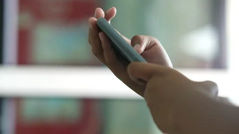 Close up hand holding smart phone for use searching data to learning in class 库存影片 217389470