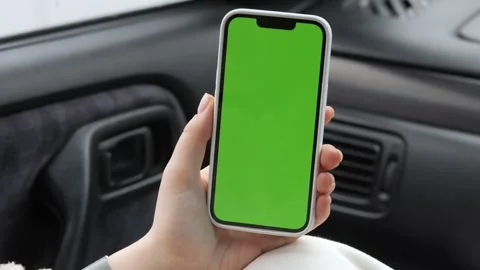 Close-up of hand holding smartphone inside vehicle Stock Footage 340955946