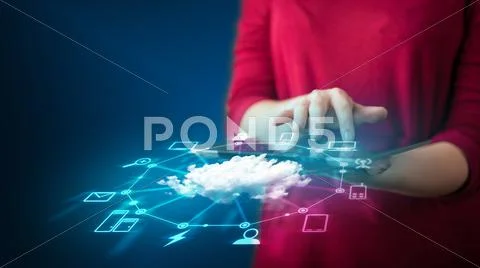 Close up of hand holding tablet with cloud network technology Stock Photos