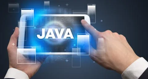 Close-up of a hand holding tablet Stock Photos